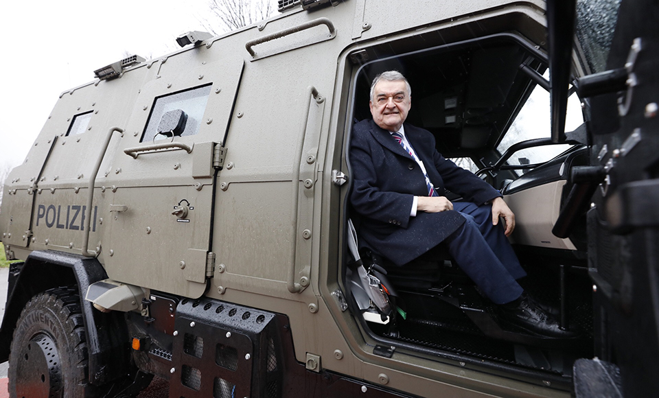 Interior Minister Herbert Reul in the 'Survivor R' anti-terror vehicle