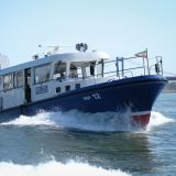 Wasserschutzpolizei heute: ein modernes Patrouillenboot auf dem Rhein bei Duisburg