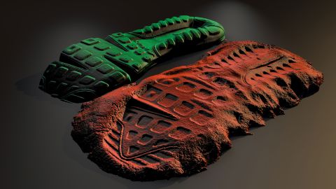 3D visualization of a shoe imprint secured with the new process (red) and the comparison shoe (green).